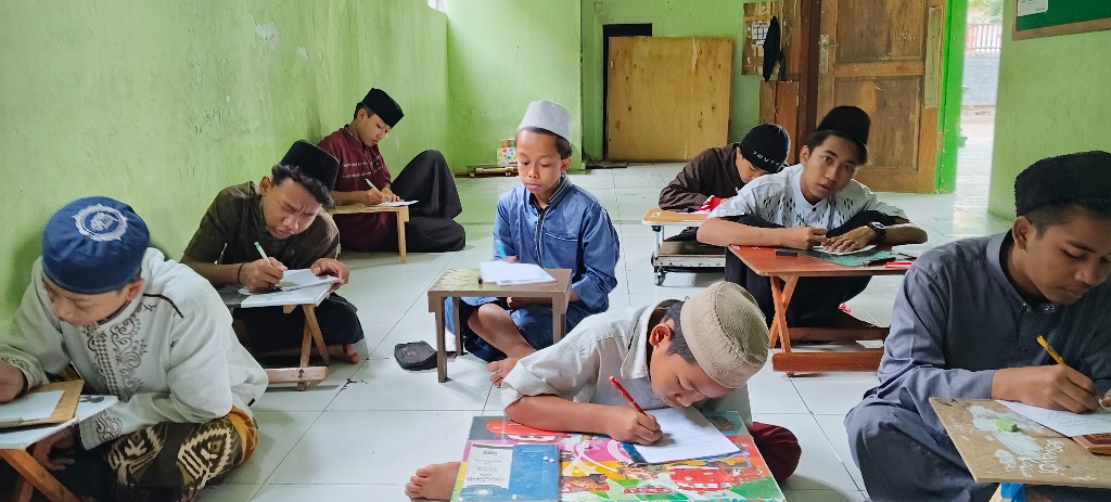 Pengajar Al-Karimah